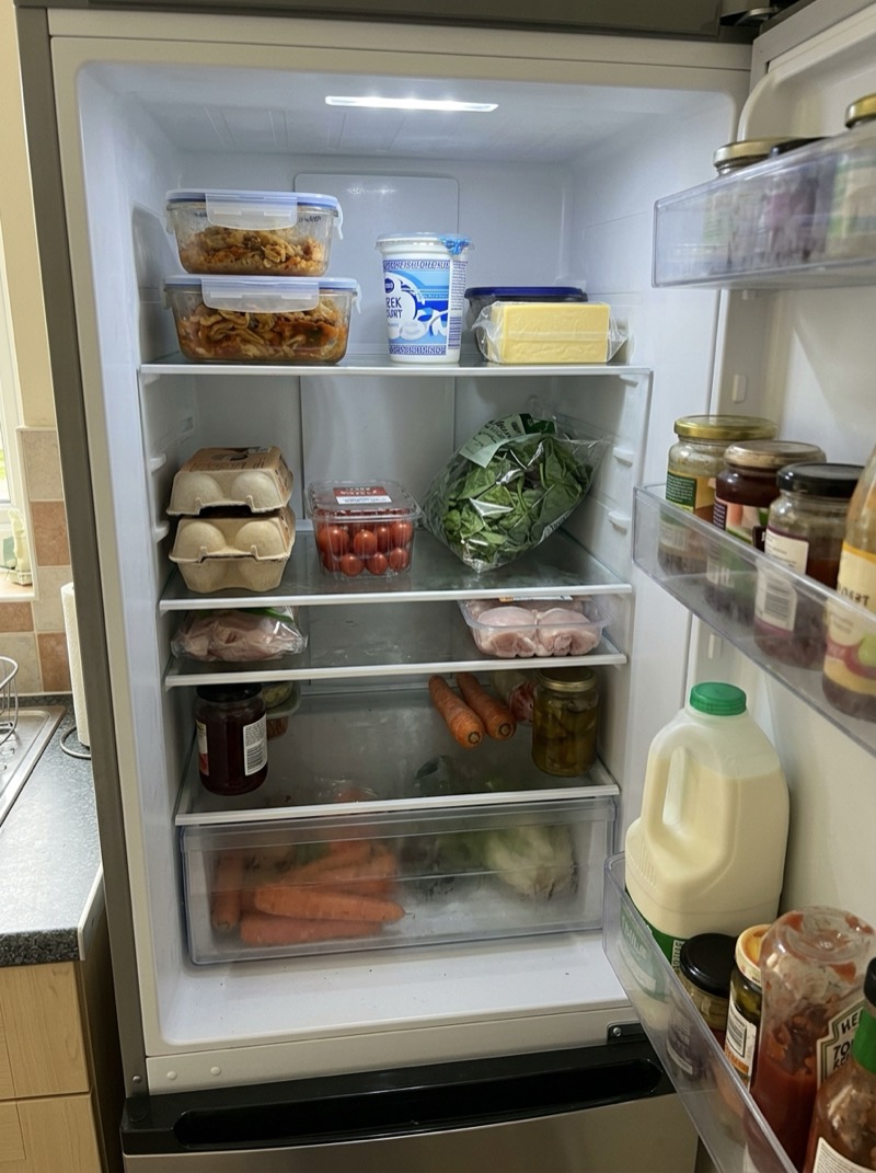 Camera view of an open fridge